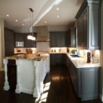 gray main cabinets white island cabinets